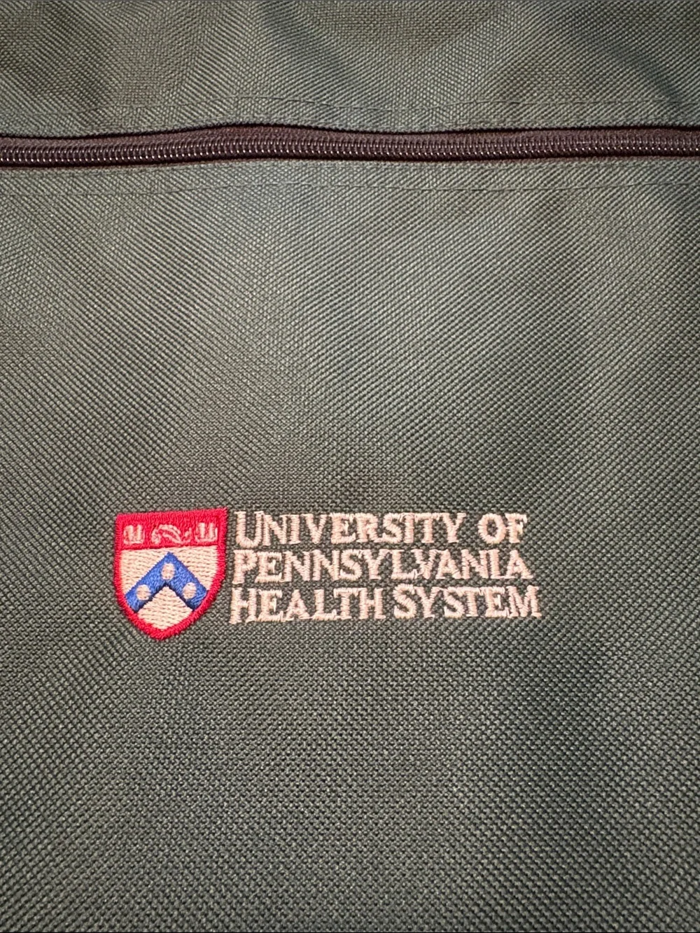 Green Messenger Bag by 4Imprint, U Penn logo
